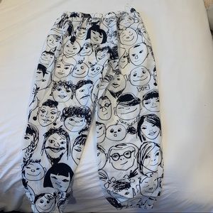 Face patterned jogger pants size L never worn